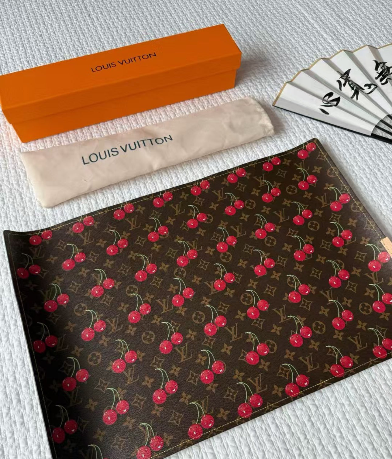 LV CHERRY EATING PLACEMAT (BROWN)