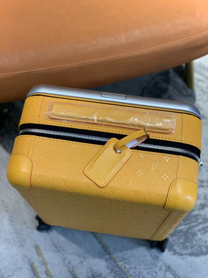 CUSTOM TAURILLON YELLOW 37L HORIZON 55 SUITCASE
